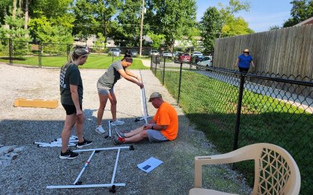 People building agility equipment